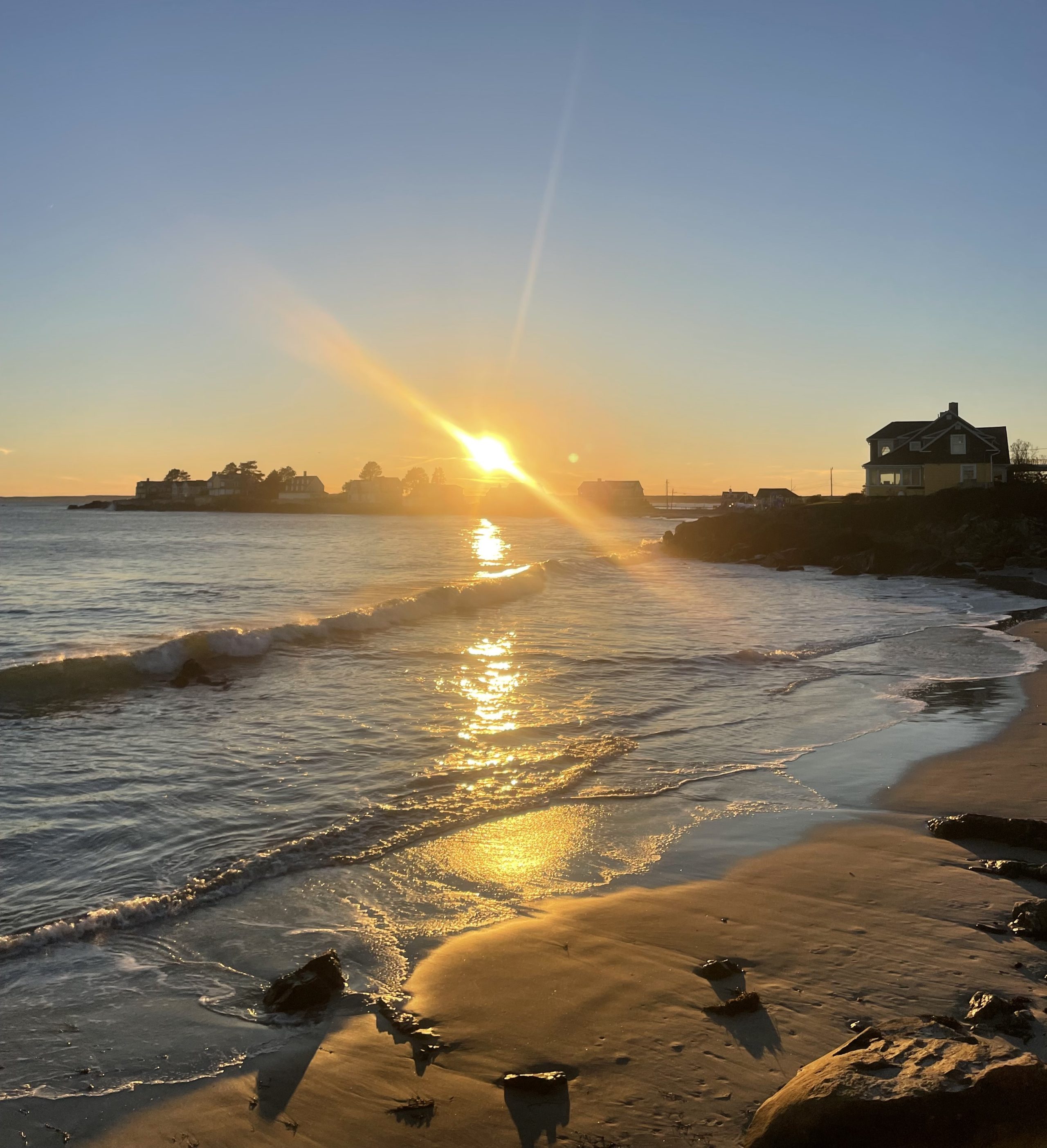 A sunset over a beach